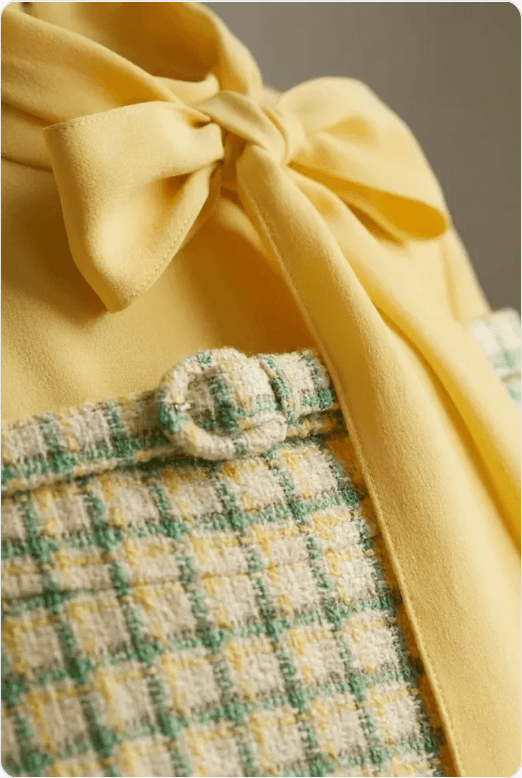 Fabric detail: Yellow bow blouse & tweed skirt set